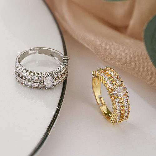 O estilo simples comuta anéis abertos redondos ovais do zircão 18K do embutimento do chapeamento de cobre banhados a ouro