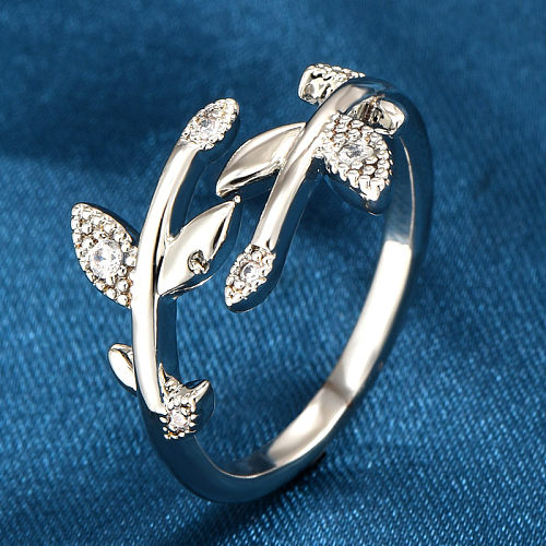 Offener Ring im modernen Stil mit Blättern, herzförmigem Auge, Kupfereinlage und Zirkon