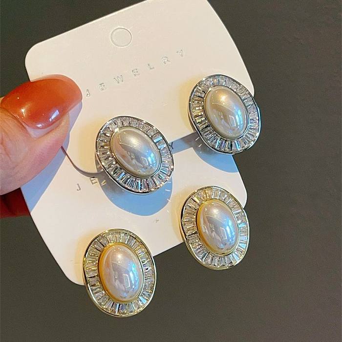 1 par de pendientes de circonita con perlas de cobre con incrustaciones ovaladas de estilo vintage