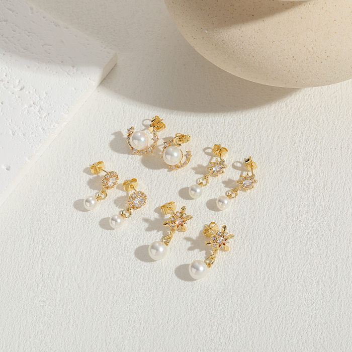 1 par de pendientes colgantes chapados en oro de 14 quilates con incrustaciones asimétricas de estrella de estilo clásico con circonita y perlas de cobre