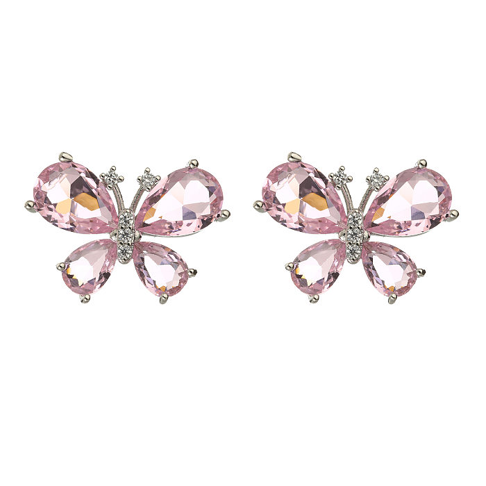 1 par de elegantes pendientes de circonita de cobre con incrustaciones de mariposa