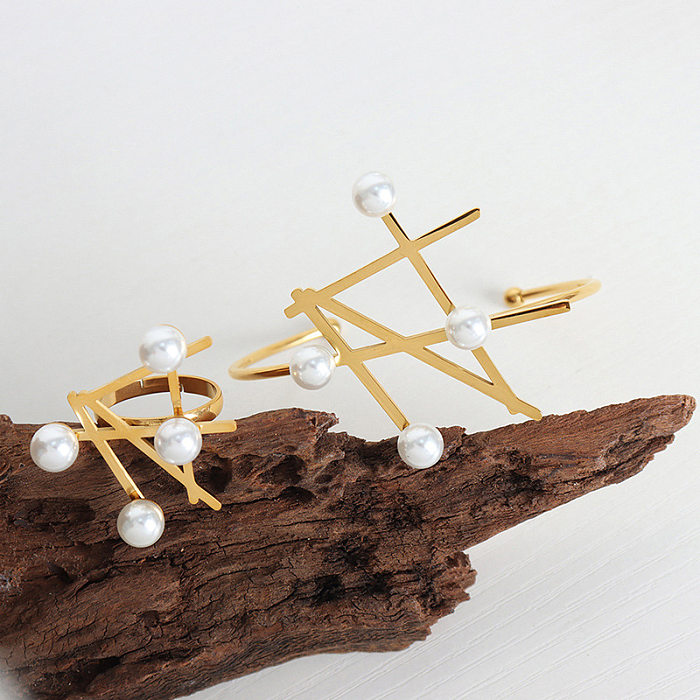Pulseras de anillos de perlas artificiales con incrustaciones de acero de titanio con perlas irregulares de estilo simple
