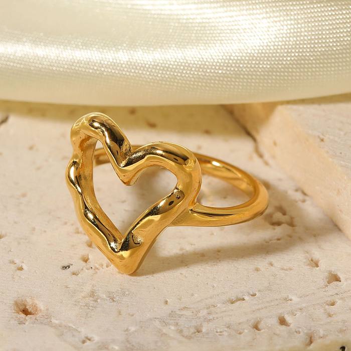 Anéis folheados a ouro 18K de aço inoxidável da forma simples doce do coração do estilo no volume