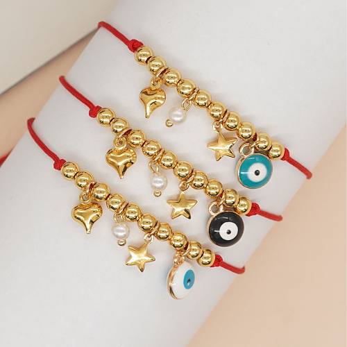 Bracelets de perles faits à la main en cuivre, corde en alliage d'oeil en forme d'étoile et de cœur décontractés
