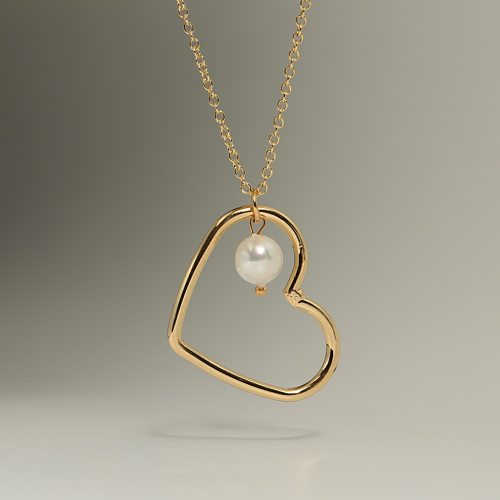 Collier de perles en cuivre avec pendentif doré simple en forme de cœur