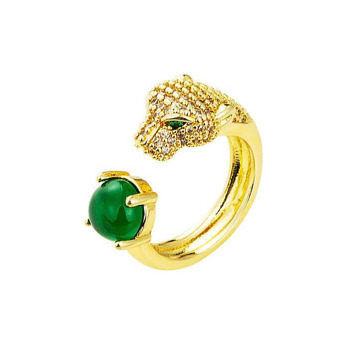 Modischer Ring mit Leopardenkopf und eingelegtem Smaragd-Zirkon