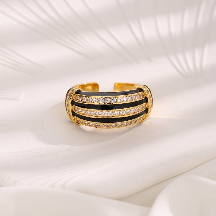 Offener Ring im IG-Stil mit geometrischer Verkupferung und Inlay-Zirkon-18-Karat-Vergoldung