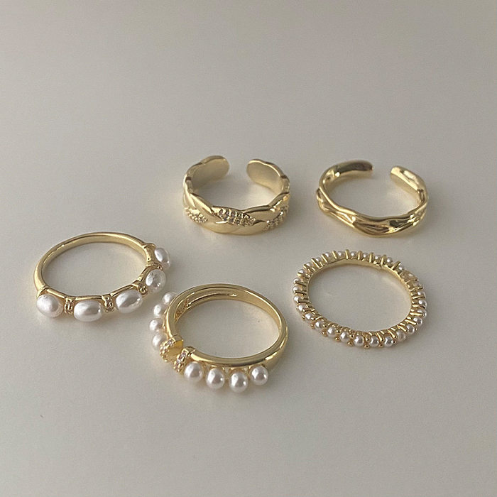 Anneaux de perles incrustés de cuivre ronds de style simple