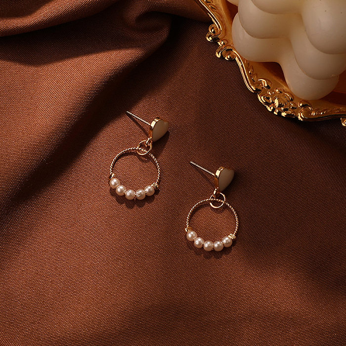Modische herzförmige Kupfer-Inlay-Perlen-Ohrringe, 1 Paar