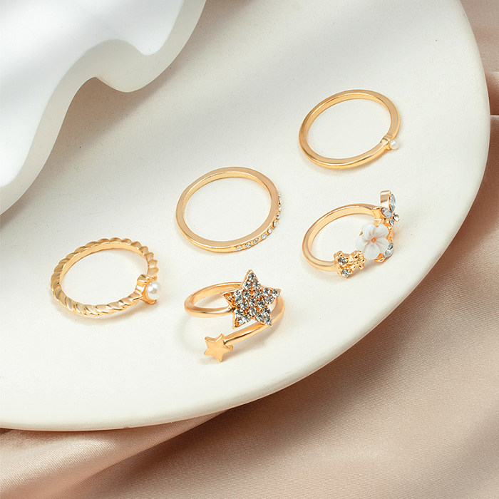Anéis de liga de flor de estrela doce femininos anéis de aço inoxidável de zircão embutido