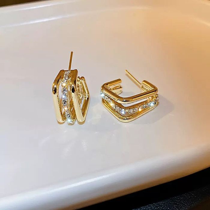 1 par glam brilhante em forma de u formato de coração chapeamento incrustação de strass artificial de cobre 14K brincos banhados a ouro