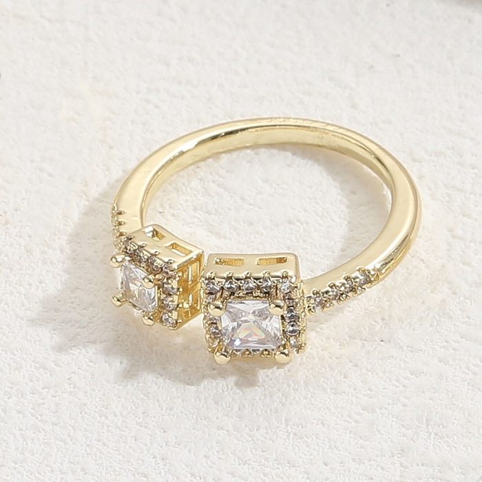 Eleganter, geometrischer offener Ring aus Kupfer mit 14-Karat-Vergoldung und Zirkon in großen Mengen