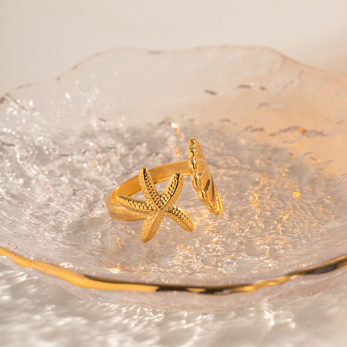 Anillo abierto chapado en oro de 18 quilates de acero inoxidable con concha de estrella de mar de playa a granel