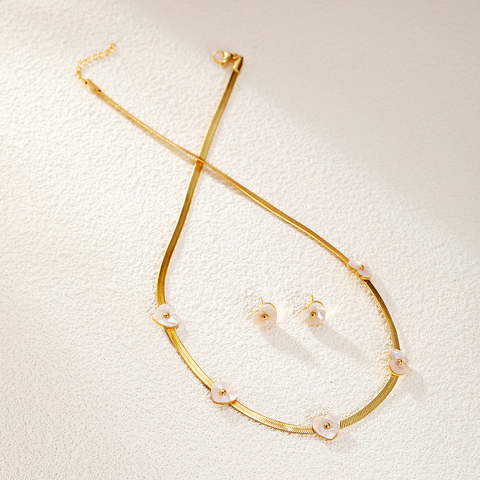 Elegante schlichte Ohrringe mit Stern- und Herzform-Blume-Edelstahl-Muschelbeschichtung, 18 Karat vergoldet