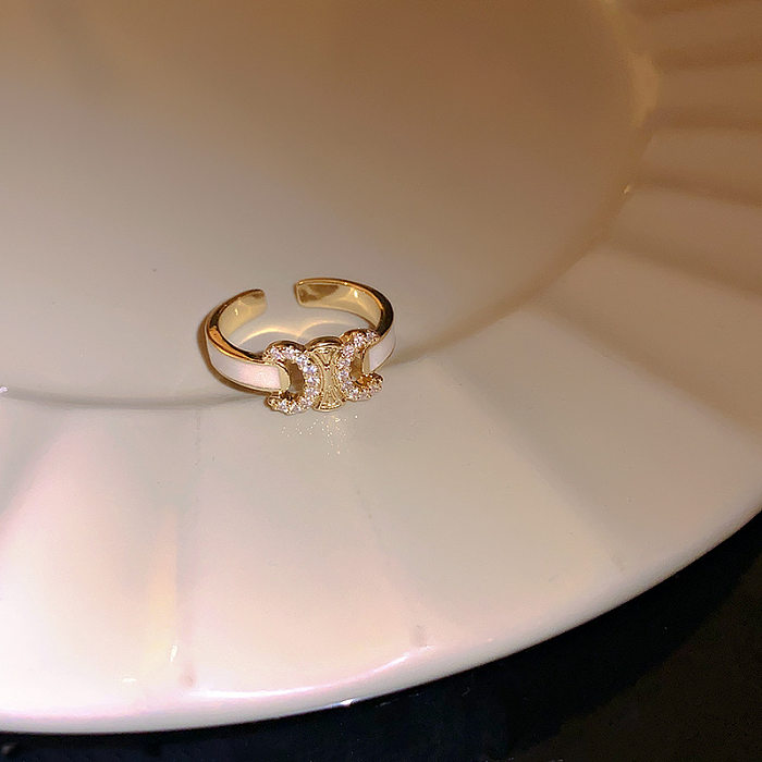 Glamouröse, rechteckige offene Ringe mit Kupfer-Emaille-Inlay und Zirkon