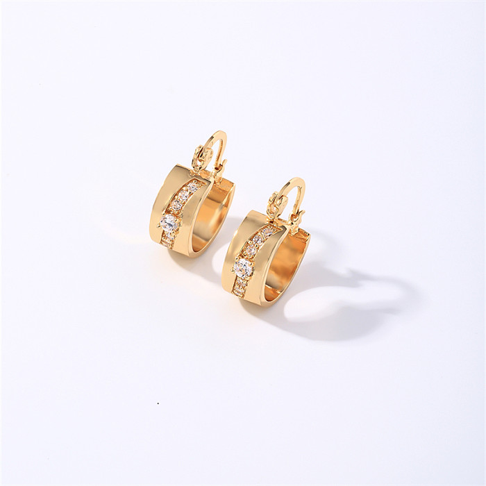 1 paire de boucles d'oreilles rondes brillantes en forme de cœur, Style Simple, incrustation de cuivre et de Zircon plaqué or