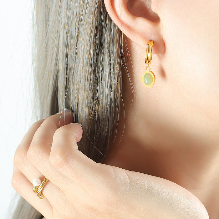 Großhandel mit eleganten ovalen Ohrringen und Halsketten aus Titanstahl mit 18 Karat vergoldetem Naturstein