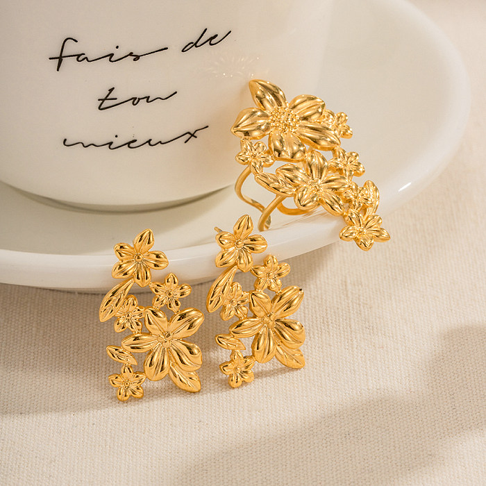 Pendientes chapados en oro de 18 quilates con revestimiento de acero inoxidable y flores de estilo moderno elegante