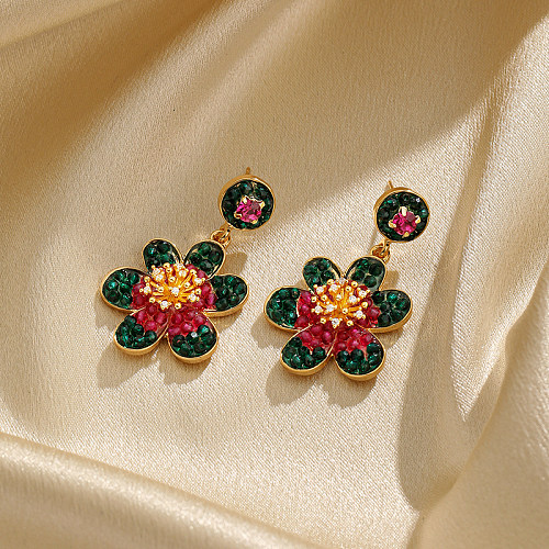 1 paire de boucles d'oreilles pendantes plaquées or 18 carats avec incrustation de fleurs de style féerique en cuivre et zircon