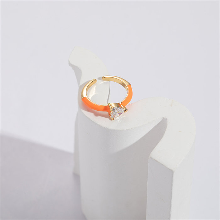 Modischer offener Ring in Herzform mit Kupfer-Emaille und vergoldetem Zirkon, 1 Stück