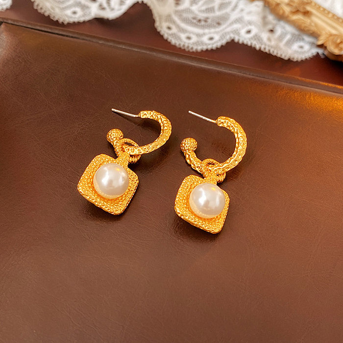 1 paire de boucles d'oreilles pendantes en forme de cœur, incrustation de strass en cuivre et de perles