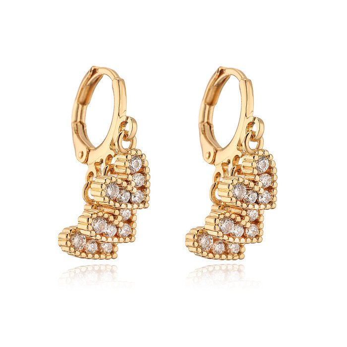 Modische herzförmige Ohrringe aus 18-karätigem Gold mit Zirkon und Kupfer