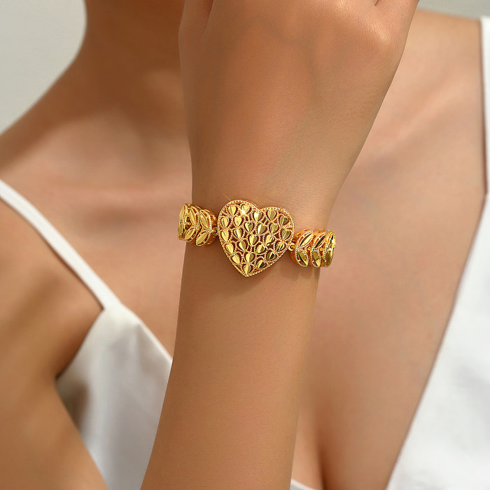 Bracelets plaqués or 18K de placage de cuivre de grain de forme de coeur doux luxueux exagéré