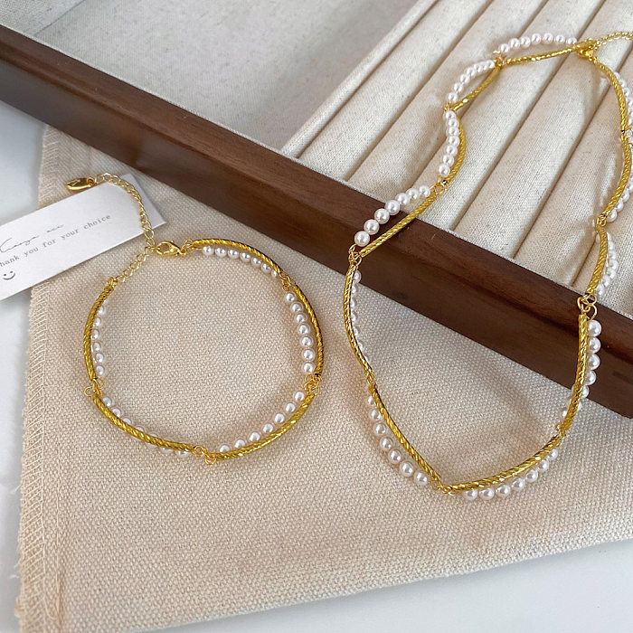 Collier de bracelets en cuivre géométriques doux