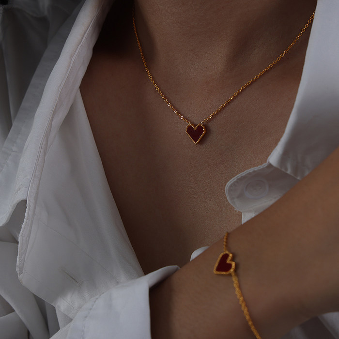 Élégant Style français en forme de coeur titane acier placage incrustation acrylique coquille plaqué or 18K Bracelets boucles d'oreilles collier