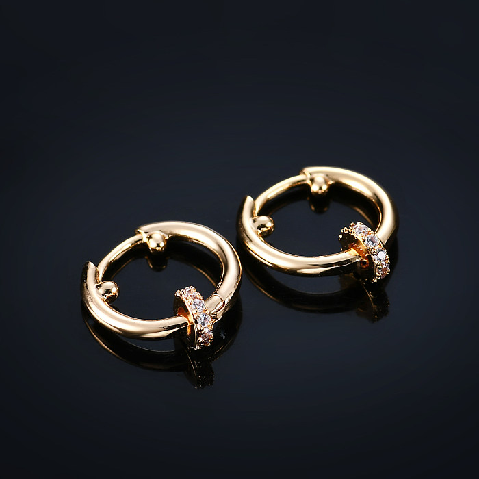 1 par de pendientes chapados en oro con incrustaciones redondas de circonita de cobre estilo Simple estilo IG