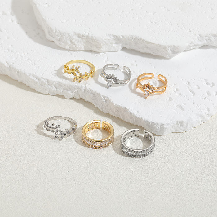 Elegante, luxuriöse, klassische Ringe mit geometrischer Verkupferung und Inlay aus Zirkon mit 14-Karat-Vergoldung