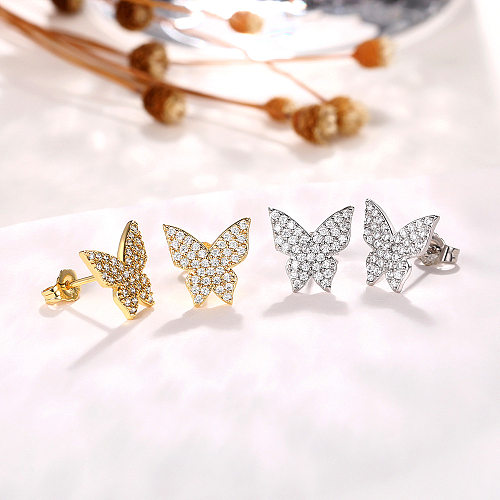 1 paire de boucles d'oreilles élégantes en forme de papillon avec incrustation de cuivre et de Zircon