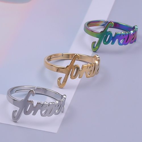 Anillos chapados en oro con revestimiento de acero inoxidable y letras de viaje