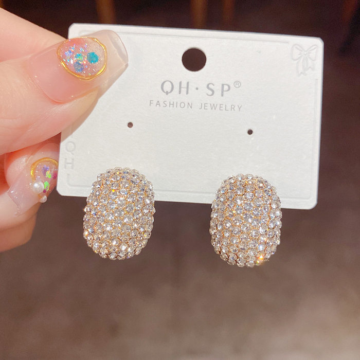 Pendientes tipo botón con diamantes de imitación, chapado en cobre, ovalados, estilo simple, 1 par