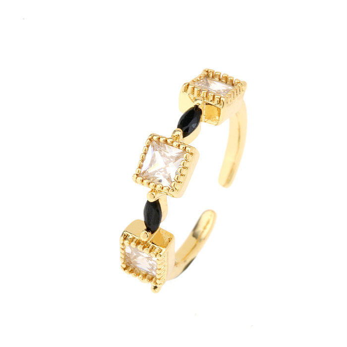 Einfacher, quadratischer, vergoldeter, offener Ring mit Inlay aus Zirkon und Kupferbeschichtung