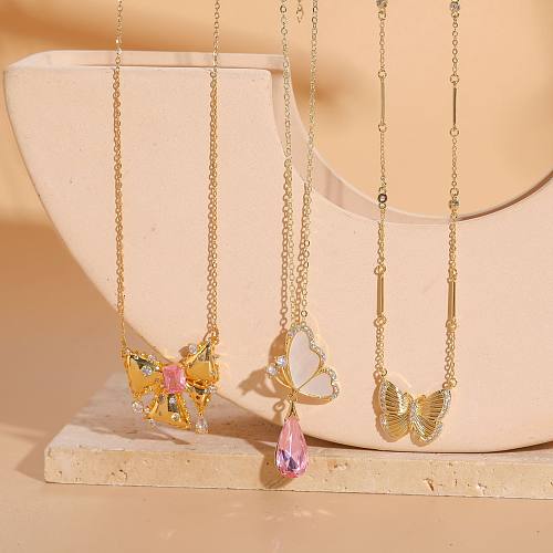 Lässige Damen-Halskette mit Schmetterlings-Schleifenknoten, Edelstahl, Kupfer, 14 Karat vergoldet, Muschel-Zirkon-Anhänger-Halskette in großen Mengen