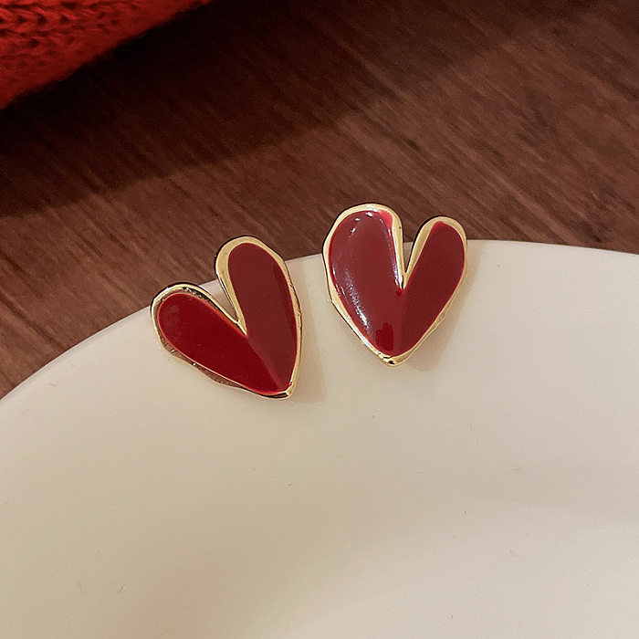 1 par de pendientes colgantes de cobre esmaltados con forma de corazón dulce