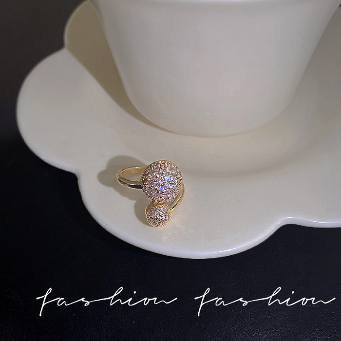 Anillo abierto de diamantes de imitación con incrustaciones de cobre y flores de estilo simple