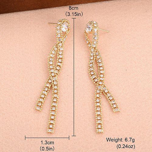 1 paire de boucles d'oreilles pendantes plaquées or 14 carats avec incrustation de strass en cuivre Glam