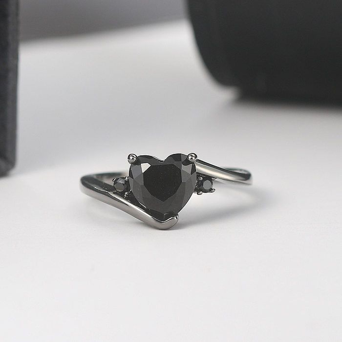 Anéis elegantes de zircão com incrustações de cobre em formato de coração