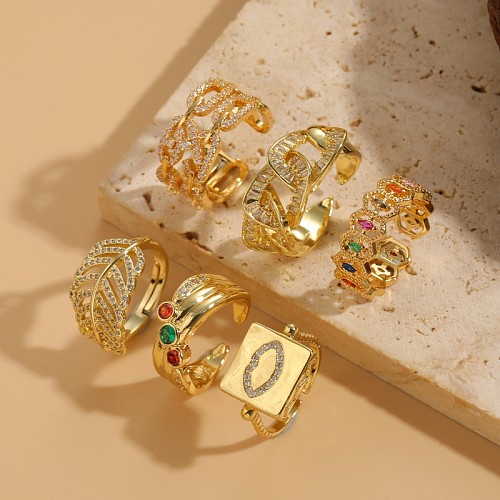 حلقات مفتوحة أنيقة على شكل أوراق الشجر مطلية بالنحاس ومرصعة بالزركون ومطلية بالذهب عيار 14 قيراط