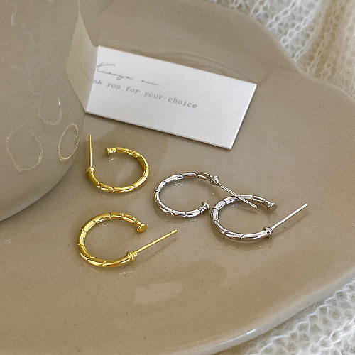 1 Paar einfache runde vergoldete Kupfer-Ohrringe