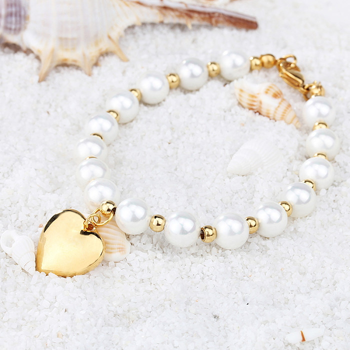 Elegante Herzform aus Edelstahl mit künstlichen Perlen, Armbänder, Ohrringe, Halskette