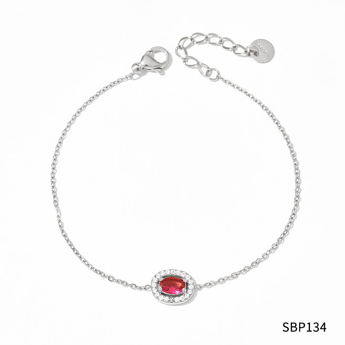 Elegante runde Edelstahl-Inlay-Zirkon-Armbänder, Ohrringe, Halskette