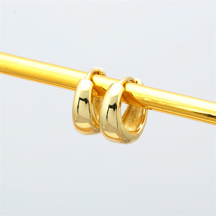 Brincos de argola banhados a ouro de cobre circular estilo simples 1 par