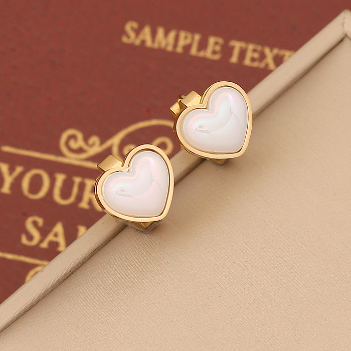 Collier de boucles d'oreilles de bracelets plaqués or de placage d'acier inoxydable de forme de coeur de style simple