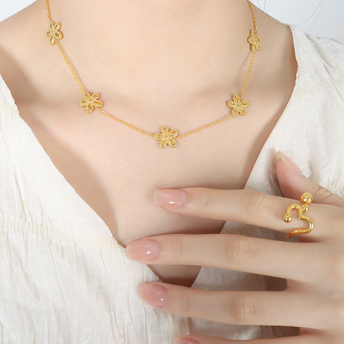 Süße Blumen-Armband-Halskette mit Titanstahlbeschichtung und 18-karätigem Gold