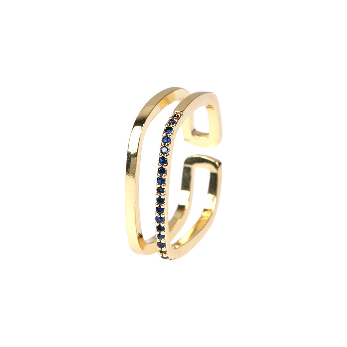 Schlichter, einfarbiger, vergoldeter offener Ring mit Zirkon-Intarsienverkupferung