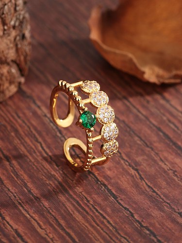 Elegante, luxuriöse, runde, verkupferte, hohle Inlay-Zirkon-Ringe im Vintage-Stil mit 18 Karat vergoldeten offenen Ringen