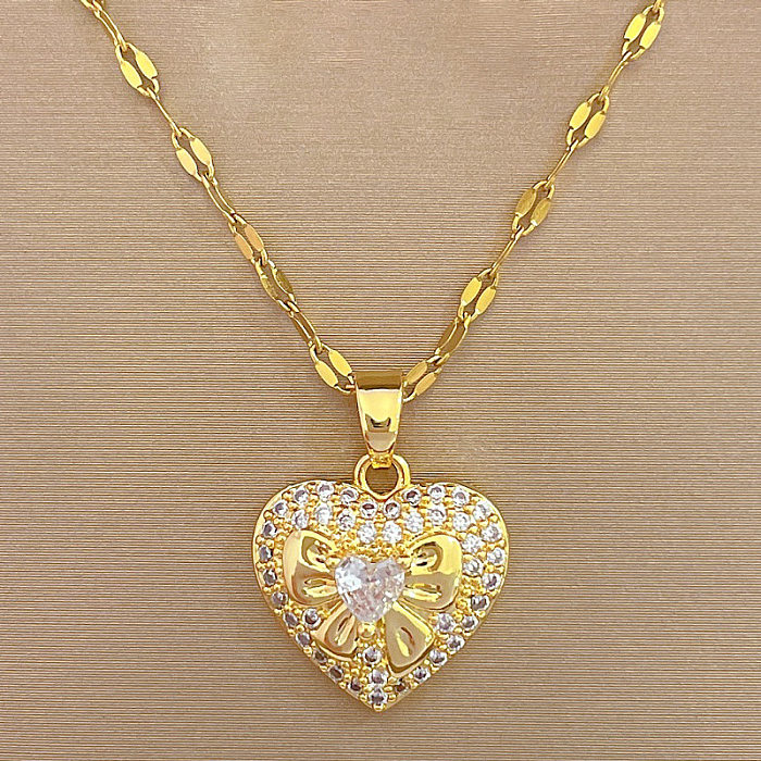 Collier avec pendentif en forme de cœur, titane, acier, cuivre, incrustation de Zircon